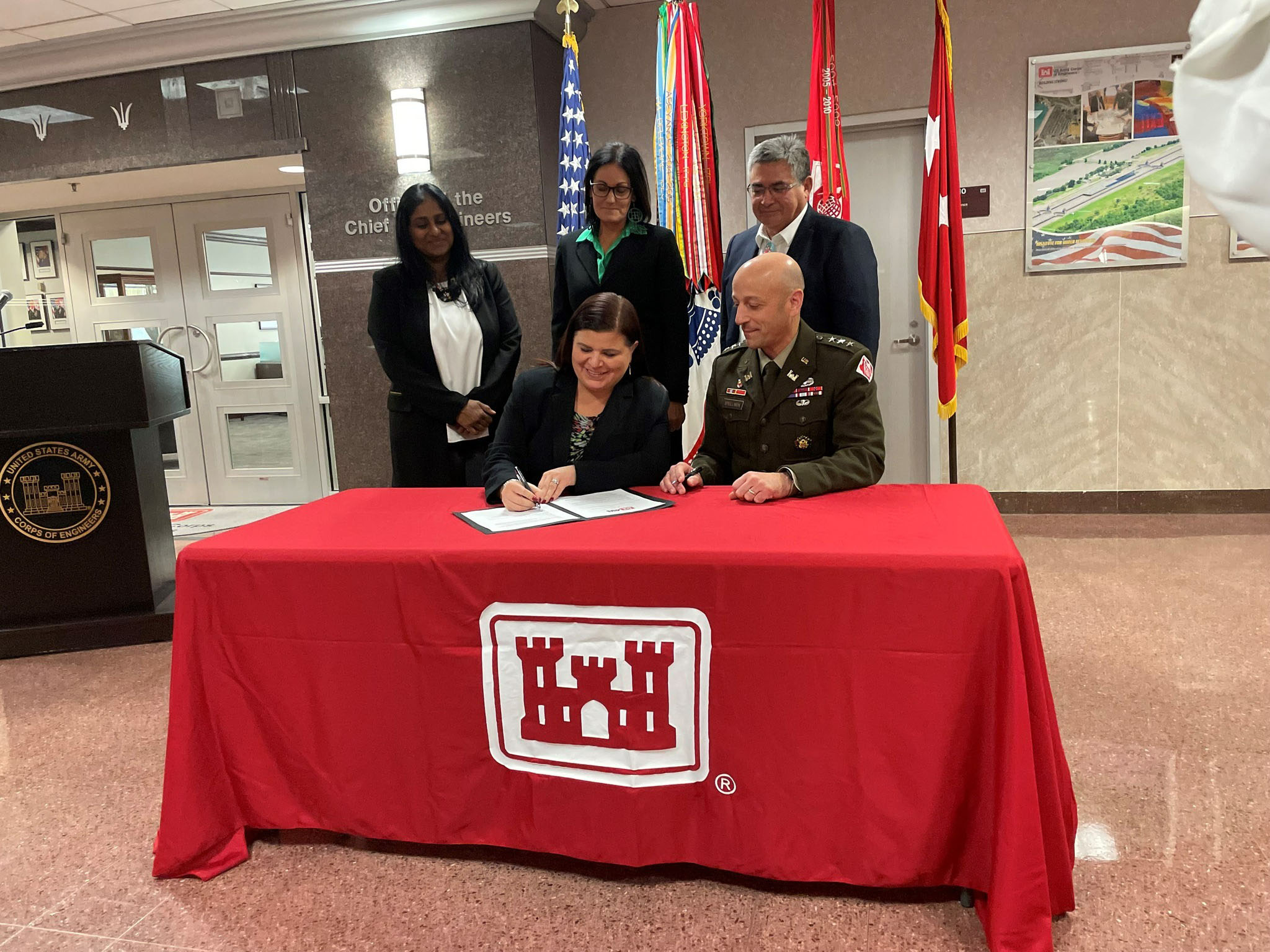 Ms. Sarah EchoHawk (front left), American Indian Science and Engineering Society chief executive officer , signs a Memorandum of Understanding with Lt. Gen. Scott Spellmon (front right), U.S. Army Corps of Engineers commanding general. The MOU provides Native American students with formal access to Army Science, Technology, Engineering and Math job and educational opportunities. (U.S. Army photo)